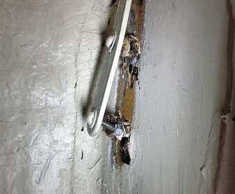 The offending chainplate (inside a locker) was not going to hang on much longer, upper left, and a repair was urgently needed.