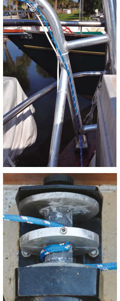 The lifting line leads from the winch and up the davit arm through a series of blocks, above. The divider on the winch drum allows the lines from both davit arms to wind or unwind simultaneously, below.