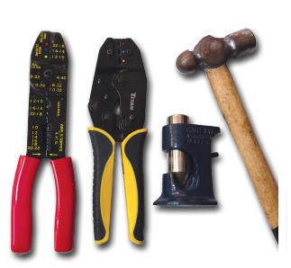 Tools the onboard electrican should have include, from left, a basic wire cutter, stripper, and crimper; a ratcheting crimper; and a heavy-duty crimper (plus a hammer to strike it with).
