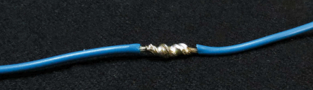 A good solder joint has a smooth surface that closely follows the contours of the wires.