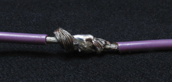 A “cold” solder joint, at left, is a poor connection. It can result from insufficient or uneven heat applied to the joint, a poorly tinned soldering iron, or corroded conductors.