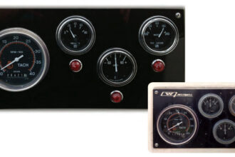 Time had taken its toll on the original engine instrument panel on John’s 1979-vintage boat, inset above, so he made a new one with telltale lights as an extra feature, main photo.