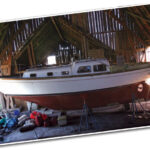After having been neglected for a few years, Finisterre, a Cheoy Lee Offshore 31, now has a barn to call her own and the chance of a future full of love.