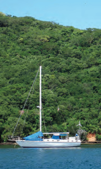 Mr. Mac, anchored at Chacachacare, Trinidad, still shines a year after painting.