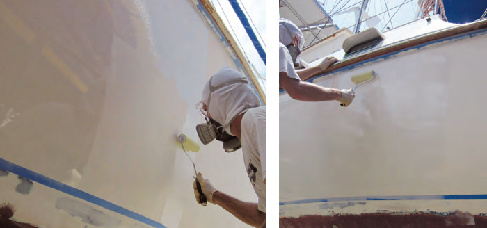 Chris applied the Awlgrip topcoat in 3-foot sections, overlapping with the wet edge of the previous section, at left. Note the difference in texture between the current section, with lots of air bubbles, and the previous section, which has already smoothed out. Once the paint was applied to a section, Chris used full top-to-bottom strokes to spread it evenly and minimize the air bubbles, at right.
