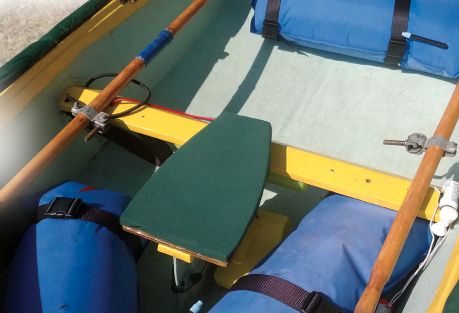 Henry glued Sunbrella over closed-cell foam to make a cushion for his dinghy’s seat.