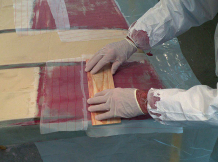 Stephen applied fairing compound and leveled it carefully with a flat board.