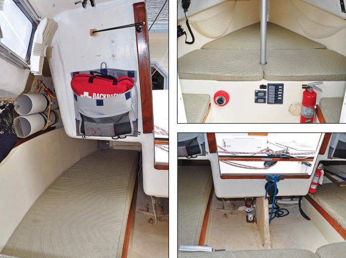 Lenny and Carla use netting and bungee cords to create stowage over the quarter berth, at left. The berth is a little narrow for sleeping on. Although it’s a generous 6 feet 7 inches long and 5 feet 11 inches wide, the V-berth is split by the compression post under the mast, upper right. The centerboard trunk supports the forward end of the cockpit, above right. There is no bilge, meaning water collects on the cabin sole.