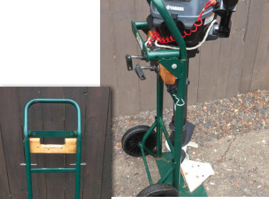 The outboard clamps to a 2 x 4 that’s notched so the motor’s bracket clears the truck’s crossbar. David fastened the board with a lag bolt at each end through the truck frame. The metal plate extends the truck’s foot to prevent the rig from tipping.