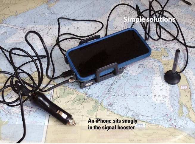 An iPhone sits snugly in the signal booster.
