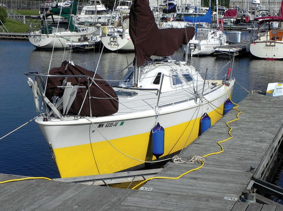 The forward hatch and the track for the self-tacking jib emphasize the expanse of the flush foredeck.