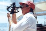 man using a sextant