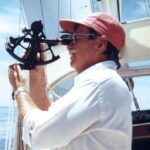 man using a sextant
