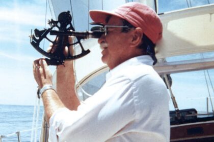 man using a sextant