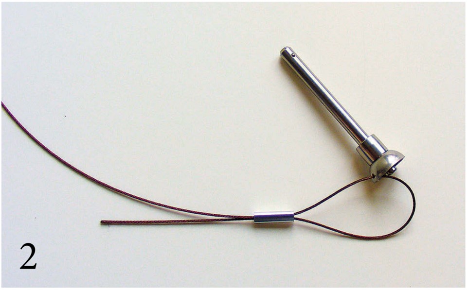 Pass the end of the wire back through the sleeve to form a loop (PHOTO 2). The length of this loop is adjusted in a later step.