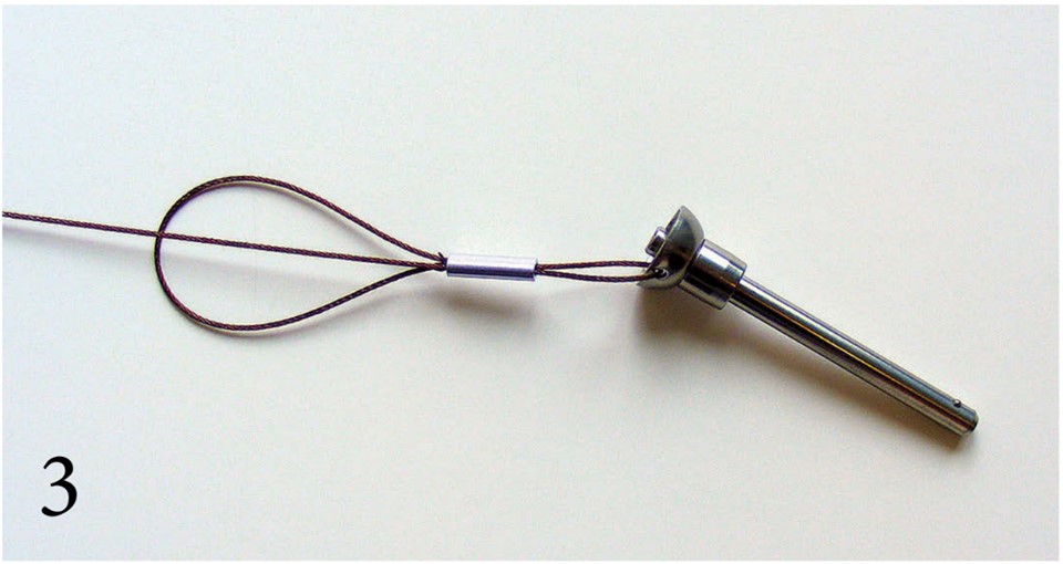 Bury the tail end of the leader wire back into (but not through) the sleeve (PHOTO 3). A sleeve one size larger than that recommended for the leader wire might be needed to accommodate the tail end.