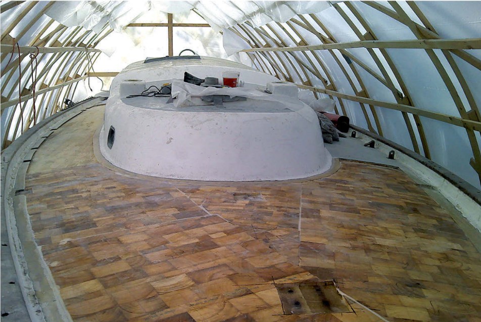 Once the new core was epoxied in place on the foredeck it was time to begin laminating the top skin.