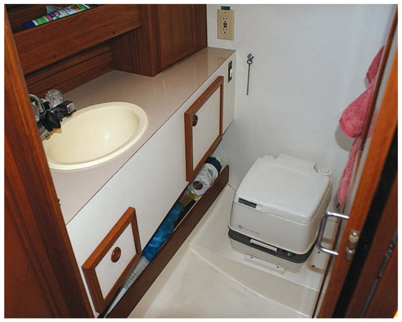 Dave and Aileen replaced the sea toilet with a portable toilet.