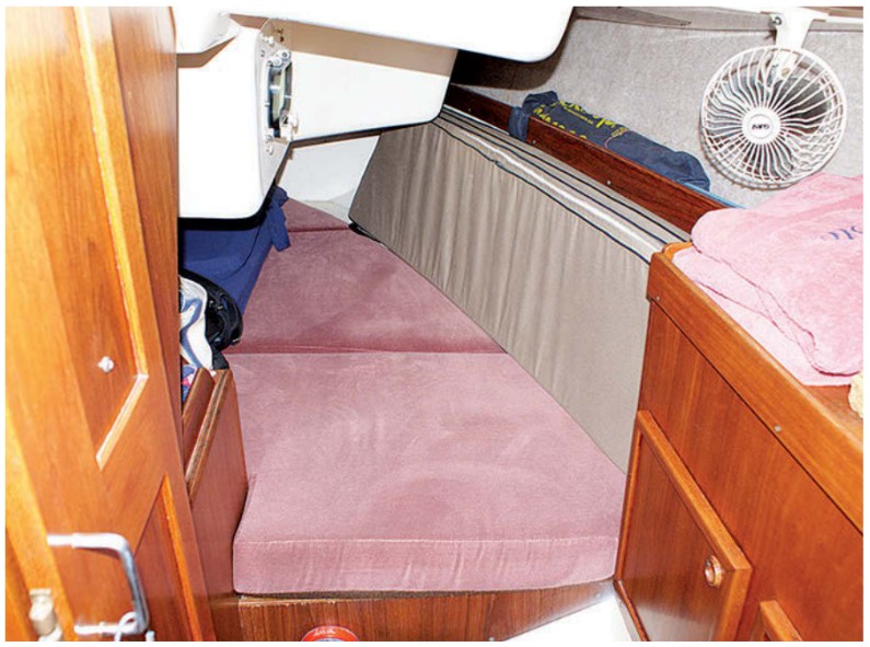A double berth is tucked under the cockpit and partially hidden behind the companionway, but it’s not for the claustrophobic.