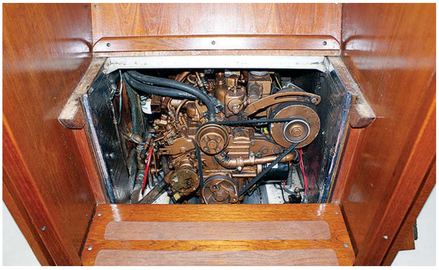 The diesel engine is behind the companionway steps.