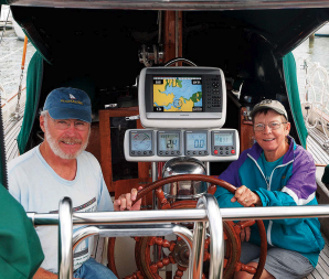 Ron and Gwyn in the cockpit with a favorite upgrade — the comprehensive suite of electronic navigation instruments.