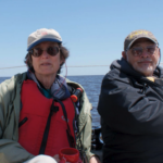 Picture of two people at sea