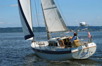 With its shippy counter transom, nicely drawn sheer, and handsomely proportioned pilothouse, the Gulf 32 carries its high freeboard well.