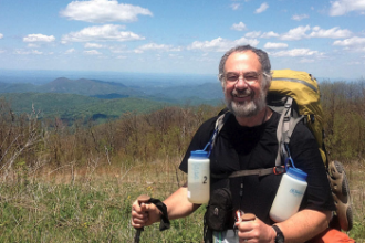 A picture of a man hiking