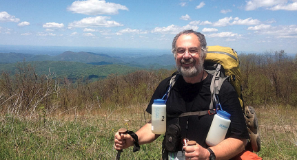 A picture of a man hiking