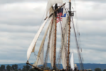 With a sparred length of 122 feet and a mast height of 94 feet, the privateer Lynx, a War of 1812 replica ship, makes Karen’s blue 30-footer at left look small. For more, see privateerlynx.com.
