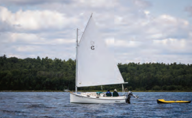 Legato, a Com-Pac Horizon Cat owned by Rahn Lawton of Binghampton, New York, sails just south of Badgeley Island in the North Channel of Lake Huron.
