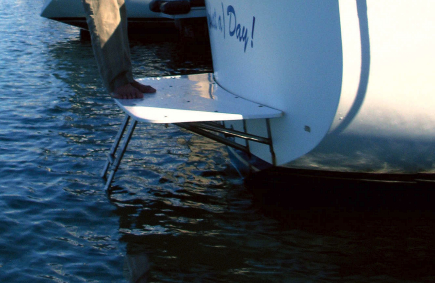 The swim platform is smooth underfoot and the ladder allows swimmers to exit the water.