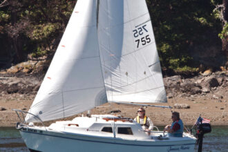 Wayne Egleston trails and sails his West Wight Potter 19, Janice Marie, in the state of Washington. She handles nimbly and, thanks to the low-deadrise hull form, has good initial stability.