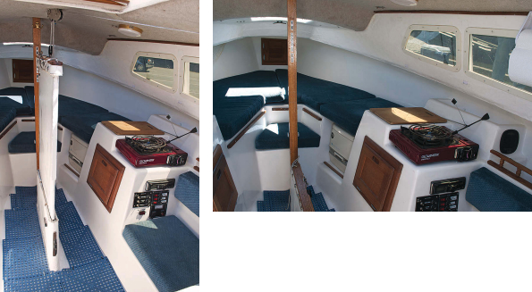 The daggerboard blocks passage through the cabin somewhat when raised, at left, but takes up less space than a centerboard trunk when it’s lowered, above. A molded fiberglass liner forms most of the furniture and provides a place for a single-burner butane stove on the starboard side and a sink on the port side.