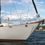 Saudades, a Pacific Seacraft 34, wears her bowsprit proudly. When she's on her mooring, Michael pulls the bobstay aside so the mooring line does not chafe on it.