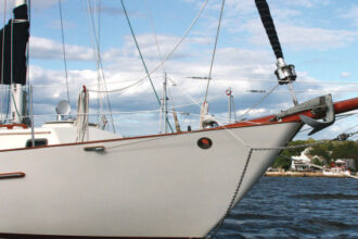 Saudades, a Pacific Seacraft 34, wears her bowsprit proudly. When she's on her mooring, Michael pulls the bobstay aside so the mooring line does not chafe on it.