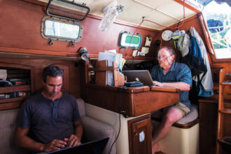 Using their laptops, Bob Steneck and George Stoyle (who joined Alaria after the long haul) are together taking up more power than all the basic boat systems.