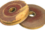 An old pair of masthead sheaves made of phenolic resin