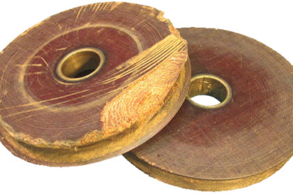 An old pair of masthead sheaves made of phenolic resin