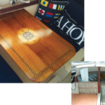 Surrounded by colorful props and reupholstered cushions, the inlaid table makes a bold impression, at left. The boat’s interior is hardly recognizable from its former state, below.