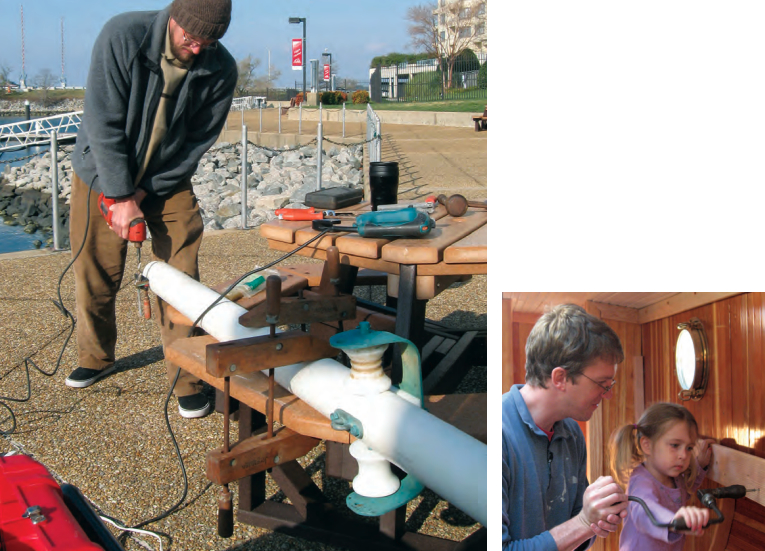 With the big wooden clamp holding Ganymede’s bowsprit firmly in place, at left, Ben modifies the cranse iron. Antigone helps her father drive a screw with his ratcheting hand-brace, below, one of the most useful items in the cruiser’s box of tools that don’t need electricity.
