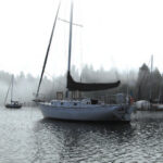 Picture of a boat in a foggy bay