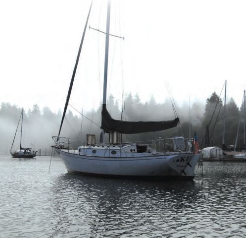 Picture of a boat in a foggy bay