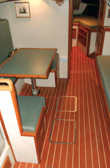 Viewed from the companionway, Art’s new cabin sole has a convincing look of teak and holly, and its textured surface feels secure underfoot.