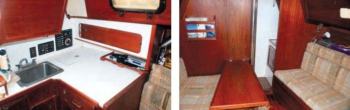 The galley in the Caliber 28 is quite small, at left, but provides an icebox and reasonable storage space. Gary and Cathy have a portable stove that they stow away when they are not using it. The saloon table, at right, folds up against the bulkhead.