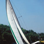 Gary and Cathy Gray sail their Caliber 28, Misty Dawn, on a large man-made lake in oklahoma.
