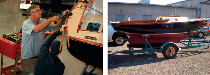Bob, who is the woodworking specialist at the shop, attaches a toerail to a Cape Dory Typhoon, at left, as a finishing touch to a full restoration. A restored Typhoon Weekender sits on her trailer, at right, awaiting transportation to new cruising grounds in her new life.