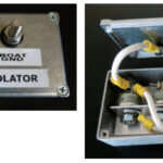 In the absence of a fault, the galvanic isolator sees little current, but a short circuit could create very high current for a short duration, hence the heavy wiring and the metal box that serves as a heat sink.