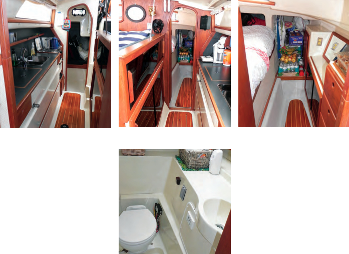 The long galley counter makes good use of the slender starboard hull, at left. A sleeping cabin is aft of it. The galley is a level down from the saloon but open to it, center. Forward of the galley is the master stateroom with its queen-sized berth, at right. The head compartment, below, is easy to wipe down.