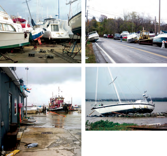 Boats ended up in a jumble, top left, although the deep-draft sailboat at the right of the photo stayed put. The road outside the adjacent marina was strewn with boats that had washed though the gate, top right. The sailboat, above, belonging to Andy, the electrician, suffered damage to her port side from the dock and to her bottom from the rocks. She was later pulled off by the Johannsens’ tug, at left, that also rode out the storm at the marina.